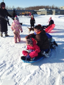 sledding at a nearby elementary school sledding hill
